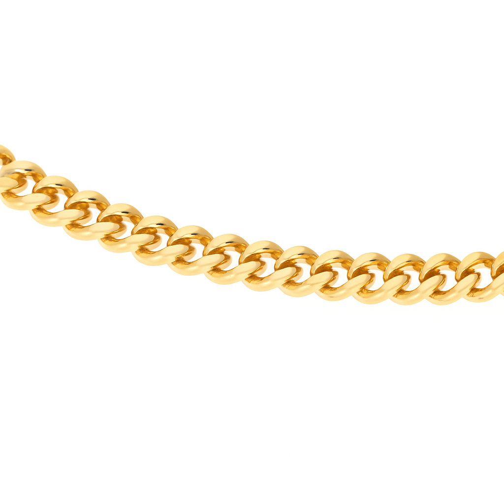 Close-up detail of the gold curb chain links on the Baby Binx anklet, showing high shine and polished finish.