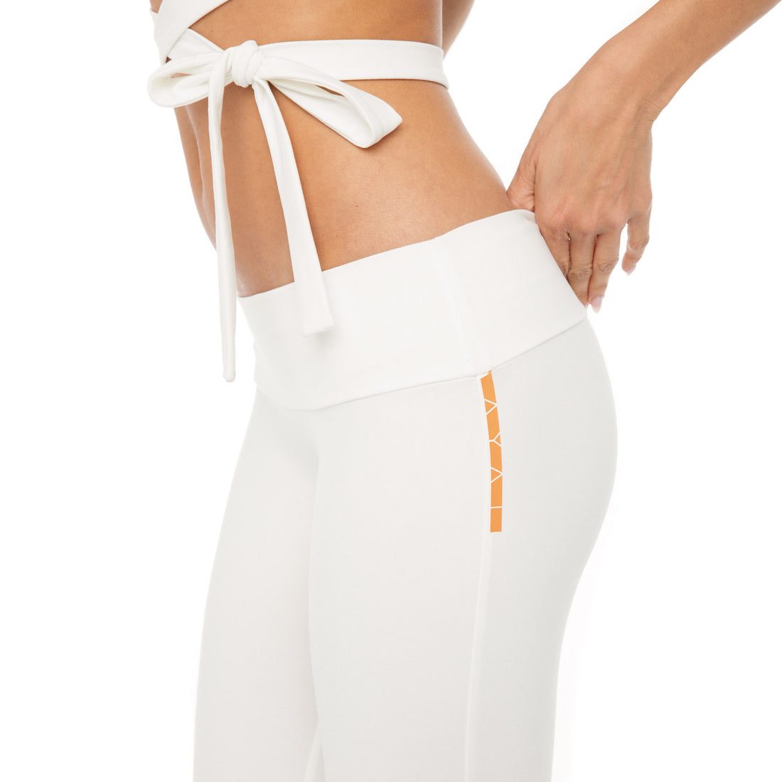 White sueded low-rise capri leggings featuring contrast orange AYAI logo**white