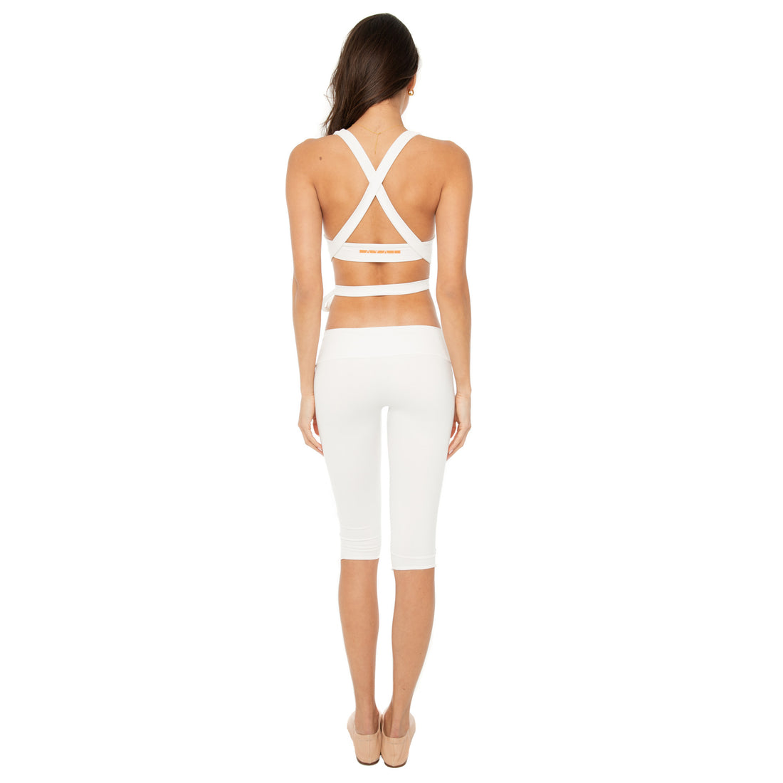 White sueded low-rise capri leggings featuring contrast orange AYAI logo**white