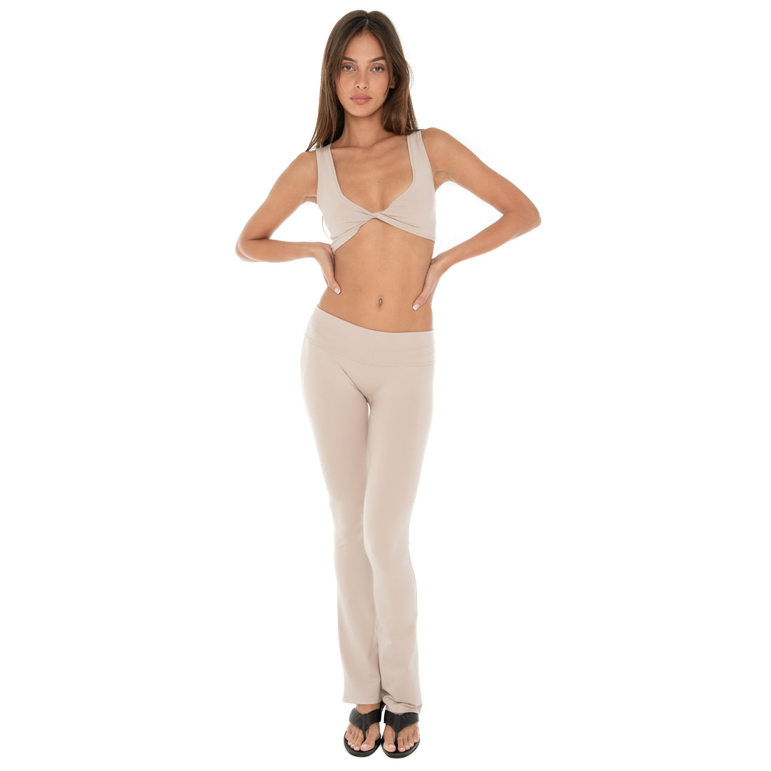 Model wearing Senna Pant – low rise flare pants, Are You Am I **nude