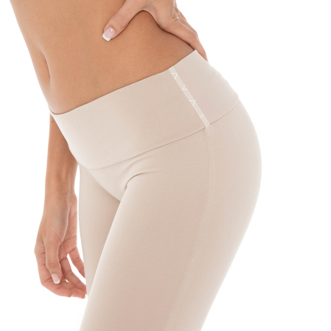 Model wearing Senna Pant – low rise flare pants, Are You Am I **nude