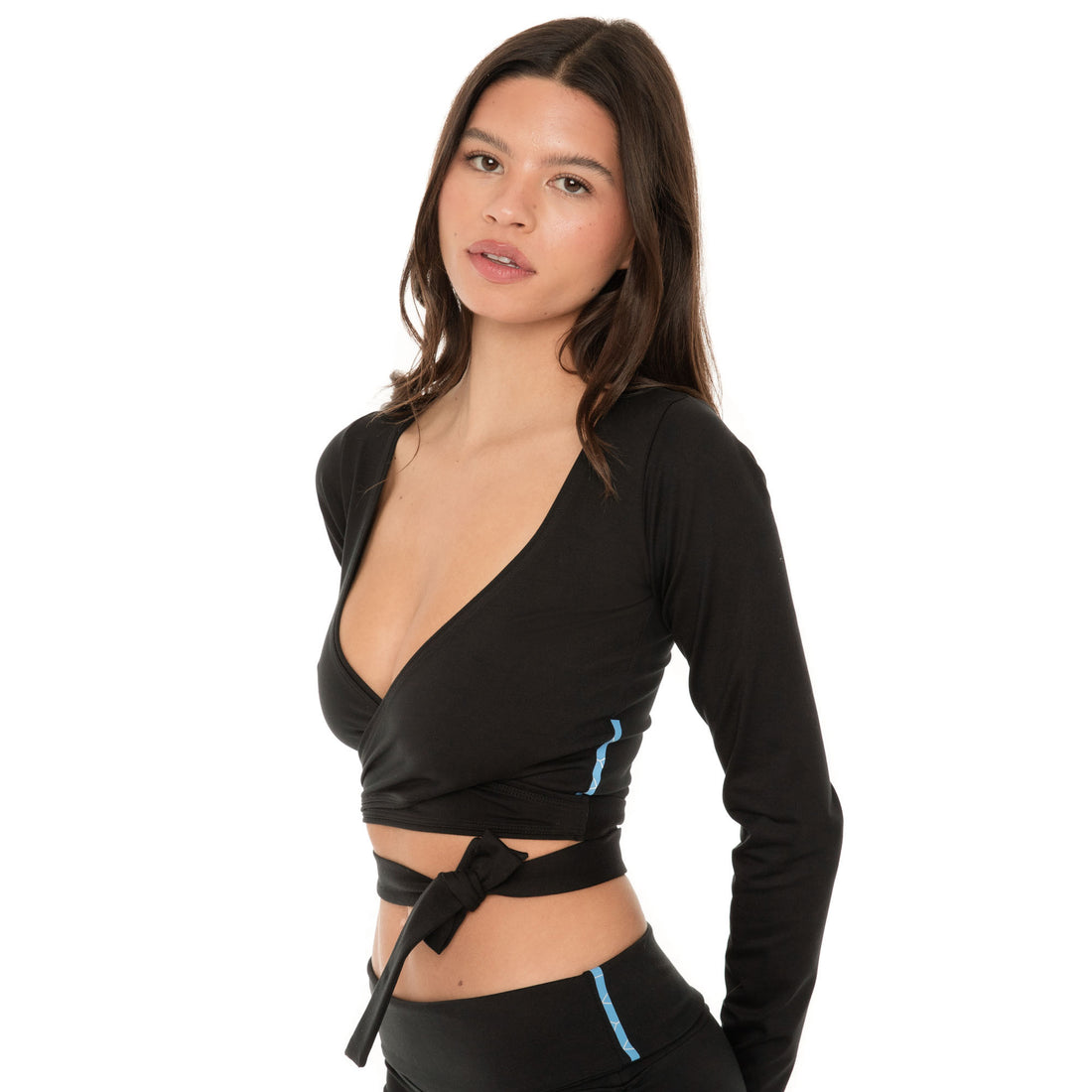 Close-up of black wrap top with deep V neckline and waist tie **black