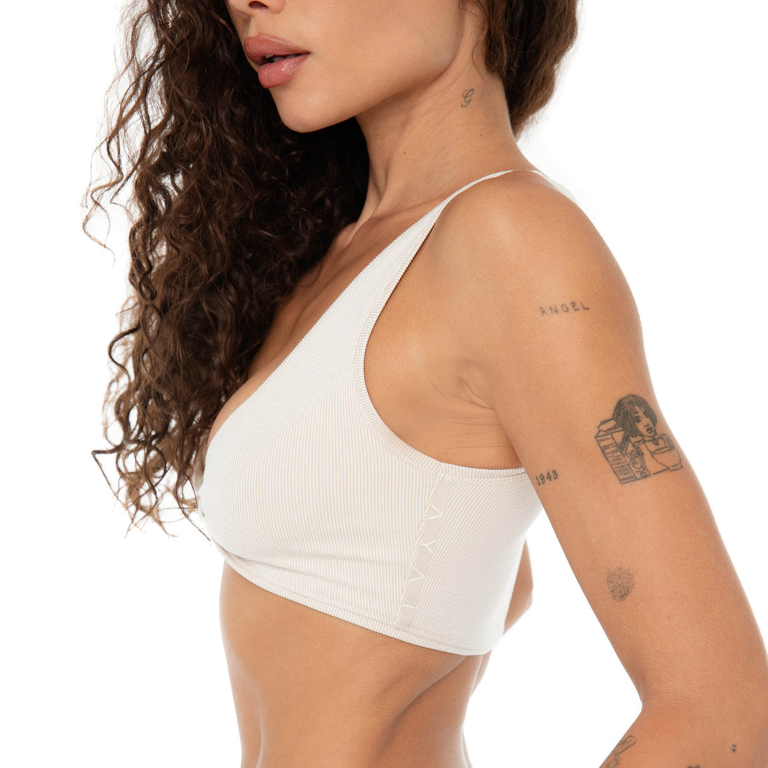 Close-up of twist-front detail on Are You Am I Alue Top in sand ribbed fabric **sand