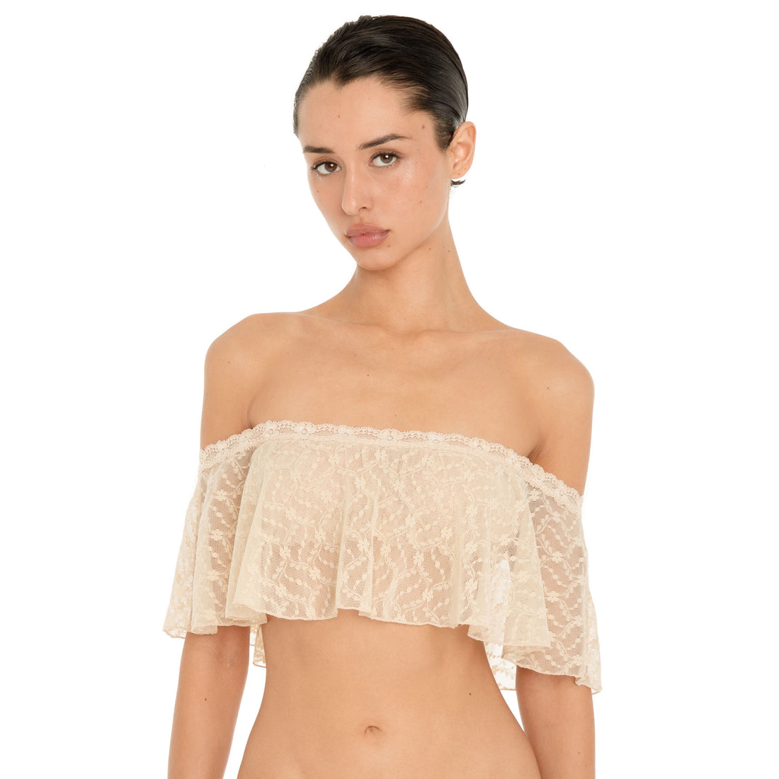 Front close up of the Liulu Top in nude, featuring sheer floral lace, delicate lace trim and an off shoulder ruffle neckline. **nude
