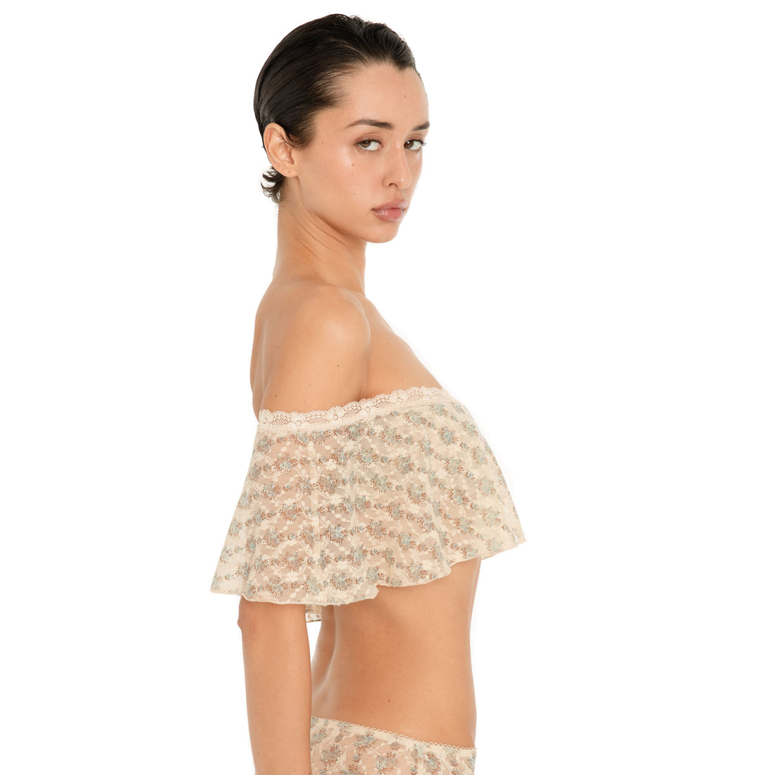 Side view of the Liulu Floral Top in Sky Blossom, showing the sheer blue floral lace and ivory trimmed off shoulder neckline **sky blossom