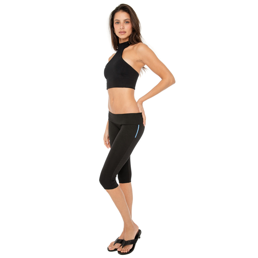 Side view of black Clio Capri showing blue logo detail **black