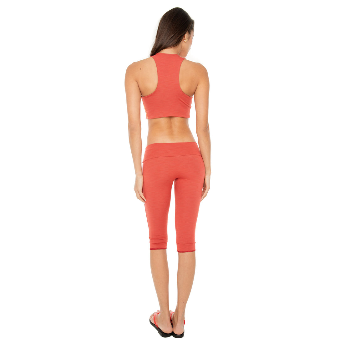 Back view of Clio Capri in cayeanne ribbed fabric**cayenne