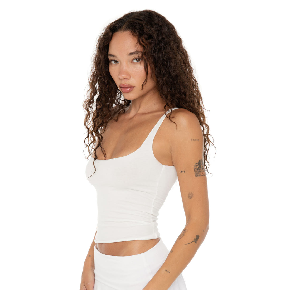 Side view of Elix Tank in white, second-skin cotton stretch tank top. **white