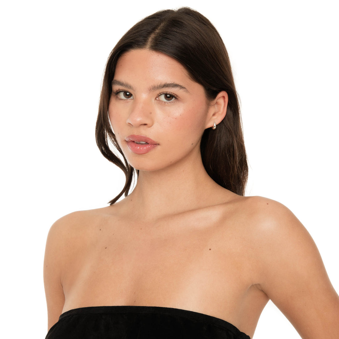 Sterling silver Fala puffed hoop earrings worn on model, polished finish