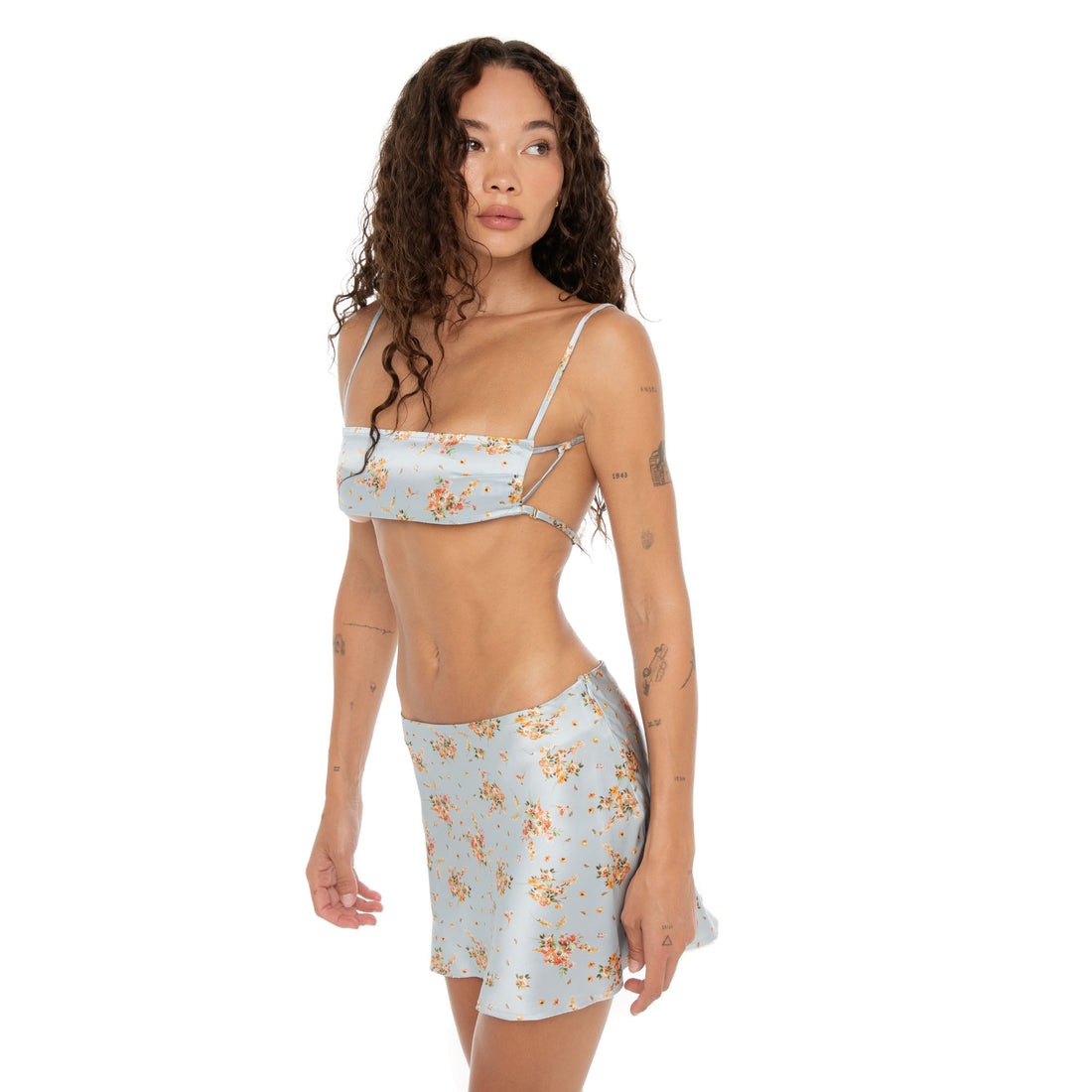 Angled view of Itsi Floral Skirt in Sky blue floral silk charmeuse. **sky