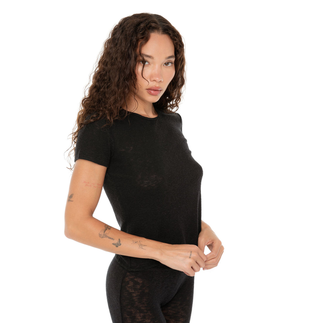 Front angle of Are You Am I Kimi Tee in black, cropped baby rib tee. **black