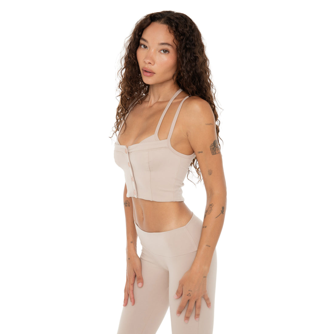 Side angle of Kylen Top in nude showing cropped fit and double straps. **nude