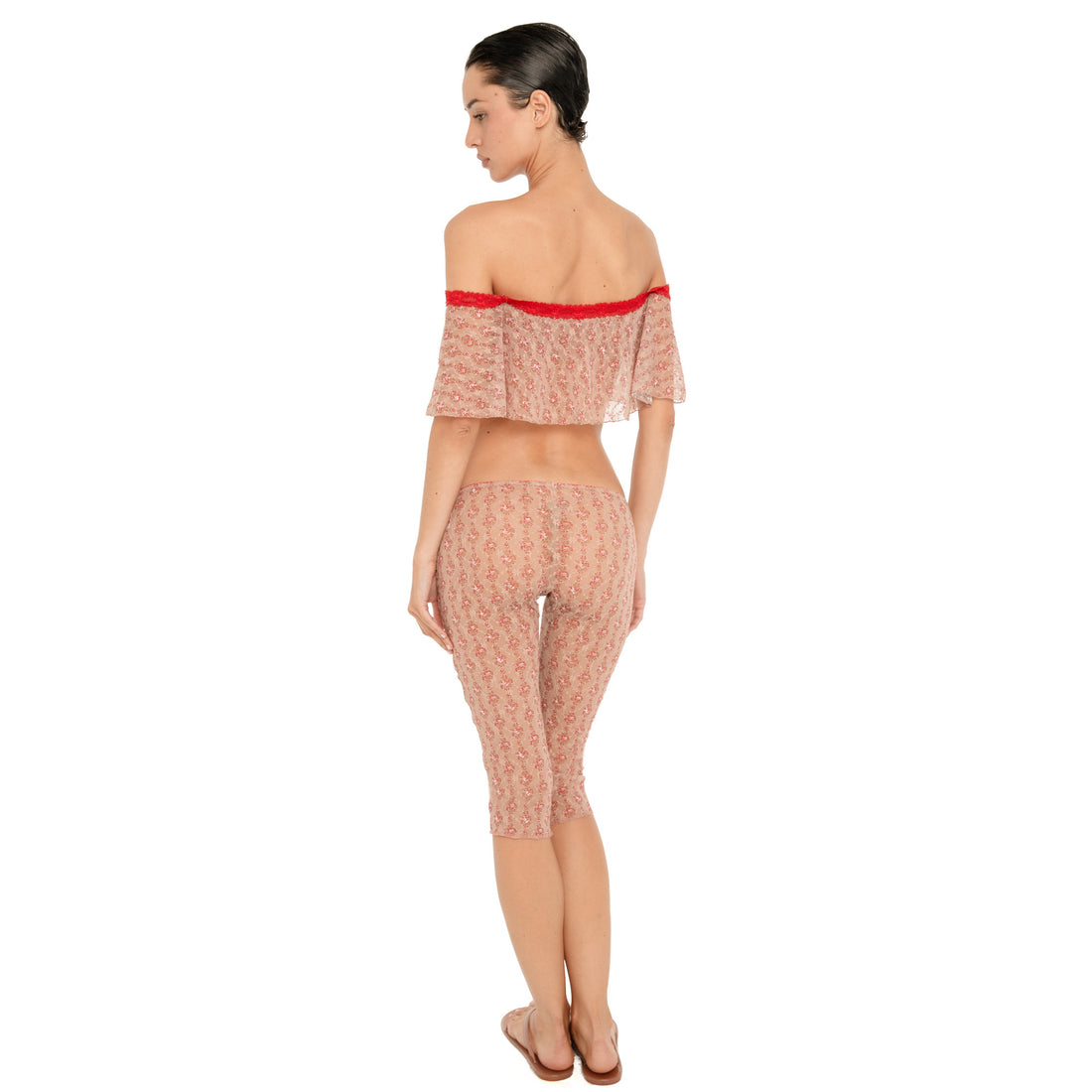 Back view of the Lyli Capri in Cherry Blossom with the matching sheer floral lace Bibi Top. **cherry blossom