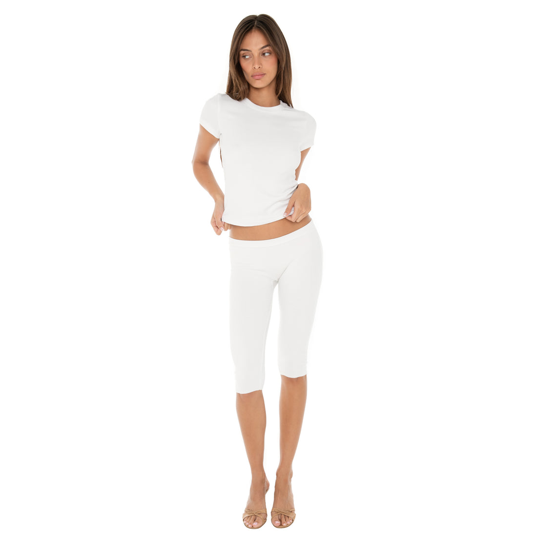 Are You Am I - Miia Capsule. Full-body view of white Miia Tee styled with white Miia Capri pants.