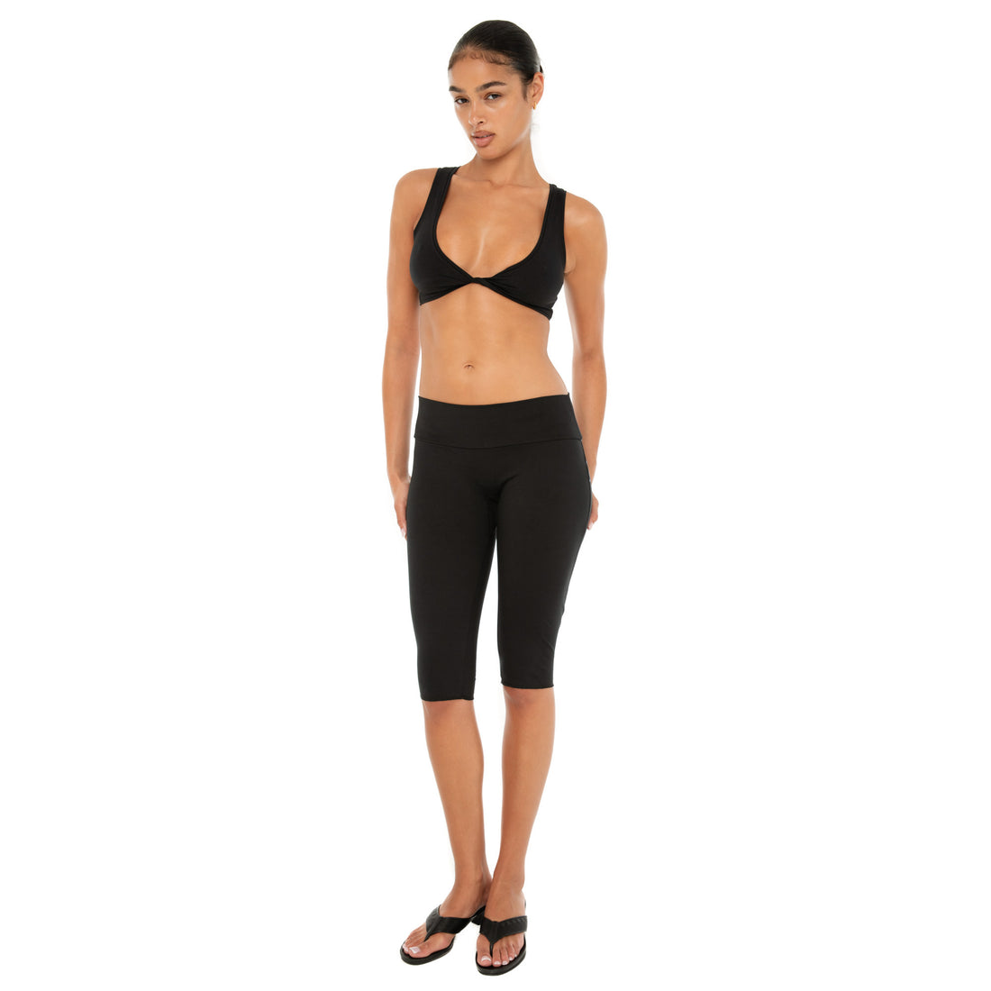 Black sueded low-rise capri leggings with tonal AYAI logo detailing**black