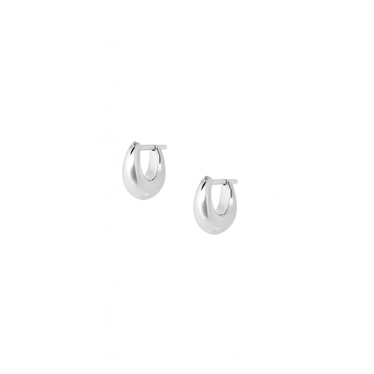 Pair of Fala sterling silver puffed huggie hoop earrings on white background