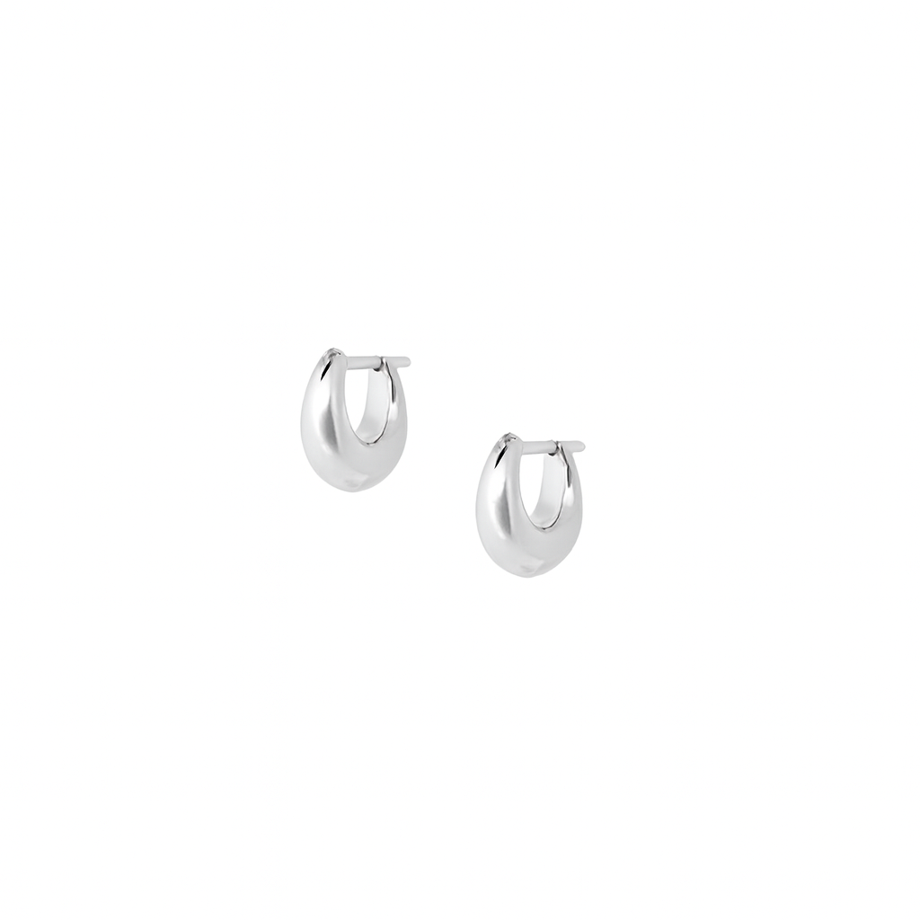 Pair of Fala sterling silver puffed huggie hoop earrings on white background