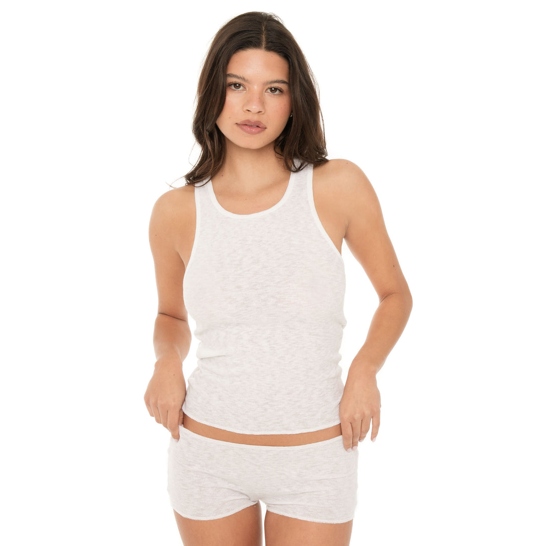 Front close-up of white Aili Short showing low-rise waistband and ribbed fabric**white