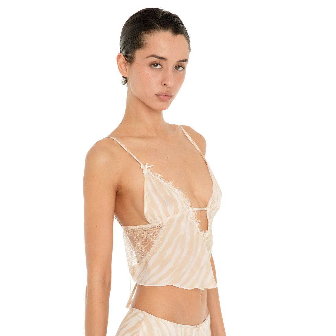 Side view of the Are You Am I Aria Camisole in Ivory Latte, showing the sheer zebra print, lace side panels and thin shoulder straps. **ivory-latte