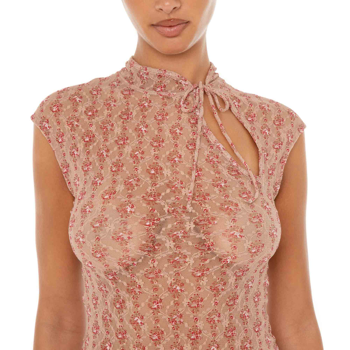 Close-up of Bibi Dress neckline featuring self-tie ribbon and keyhole cutout in red floral lace. **cherry blossom