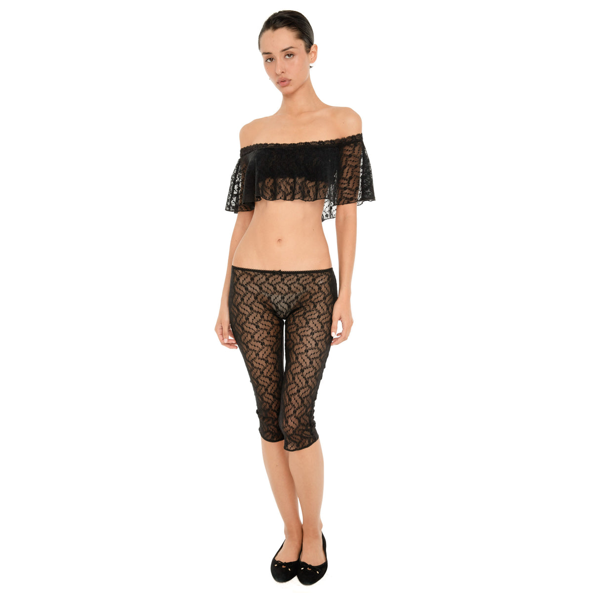 Liulu Top in black sheer lace, an off shoulder cropped ruffle top, styled with matching black lace capri pants **black