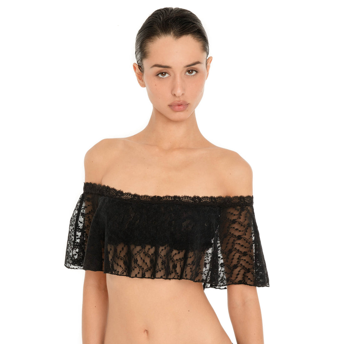 Front close up of the Liulu Top in black, featuring sheer floral lace, delicate lace trim and an off shoulder ruffle neckline **black