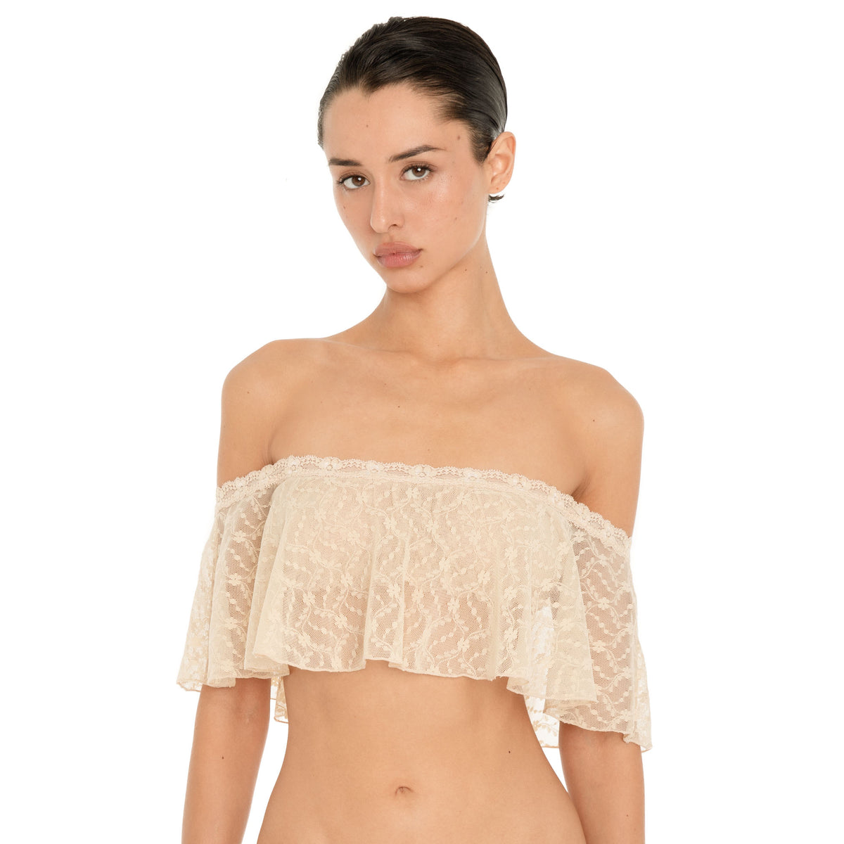 Front close up of the Liulu Top in nude, featuring sheer floral lace, delicate lace trim and an off shoulder ruffle neckline. **nude