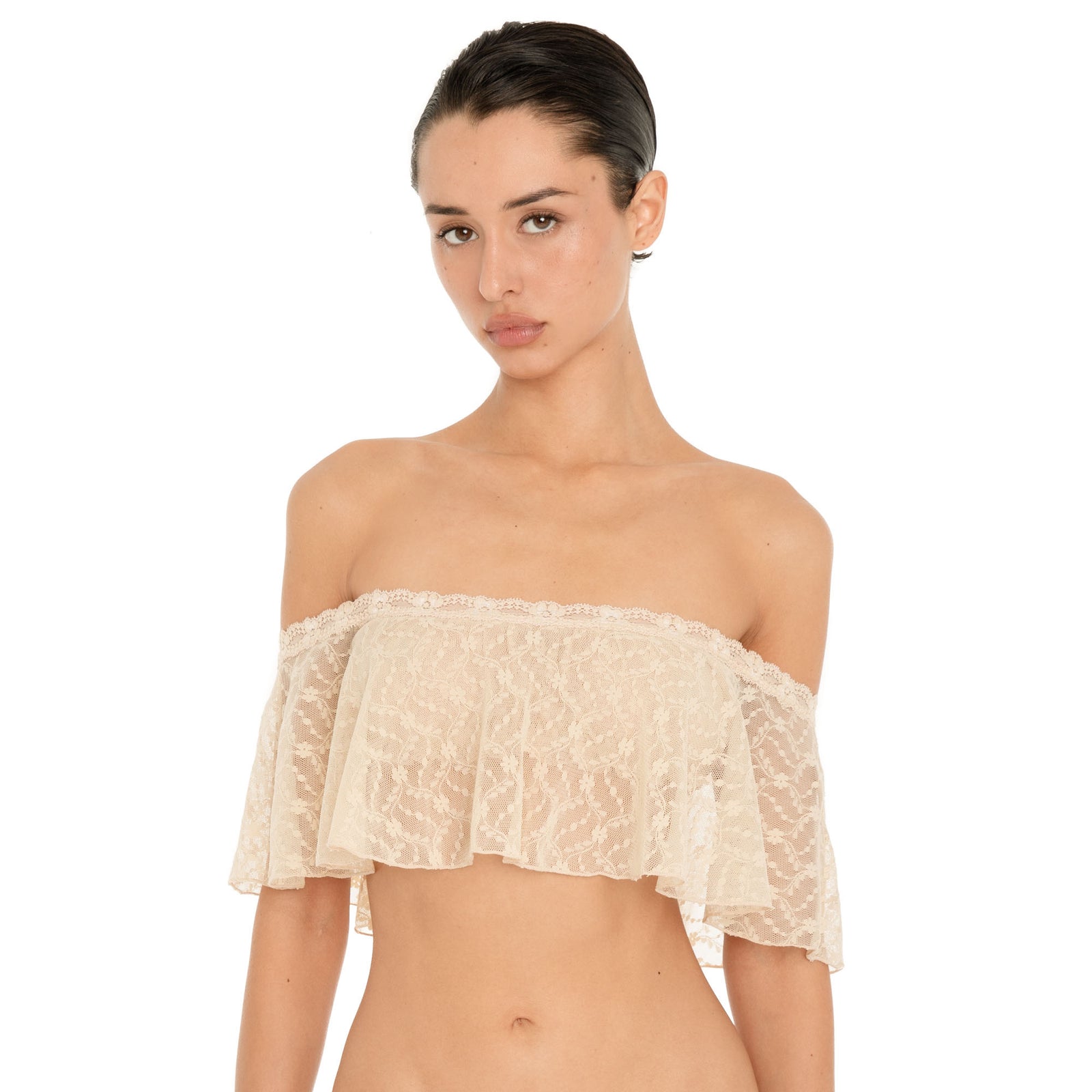 Front close up of the Liulu Top in nude, featuring sheer floral lace, delicate lace trim and an off shoulder ruffle neckline. **nude