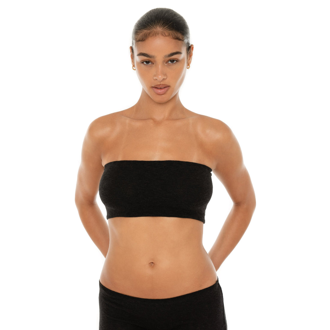 Front view of the black Aili Tube showing its straight strapless neckline and fitted cropped silhouette **black
