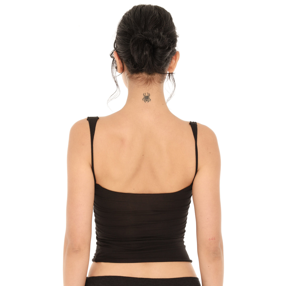 Back view of the black Elix Tank, showing the low scoop back, the wide straps and the slightly ruched fit at the sides **black