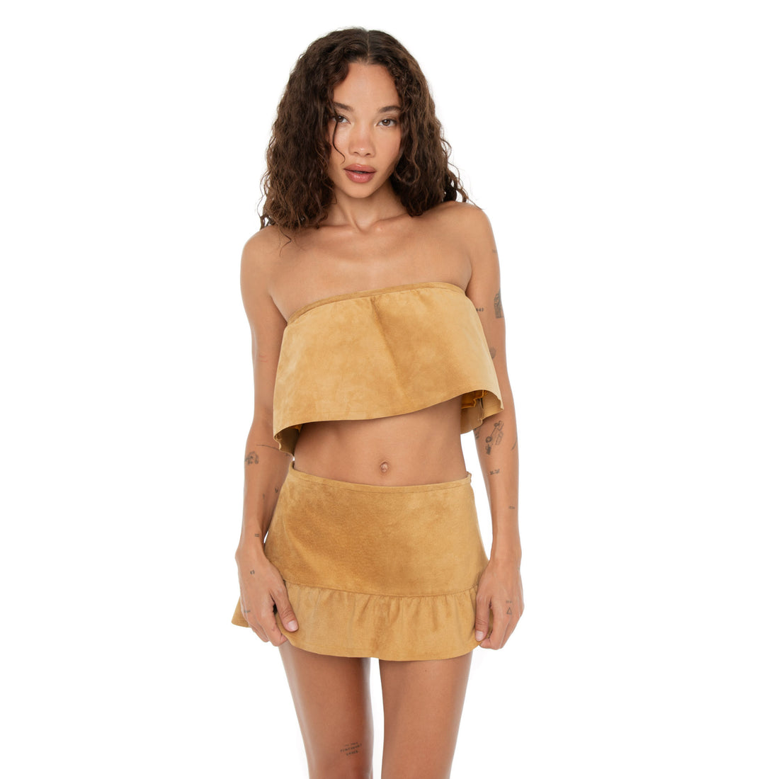 Front close-up showcasing the structured suede texture of the Etra Top and Skirt **butterscotch