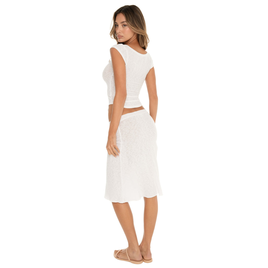 back view of white ribbed midi skirt with mid rise fit and fluid silhouette **white