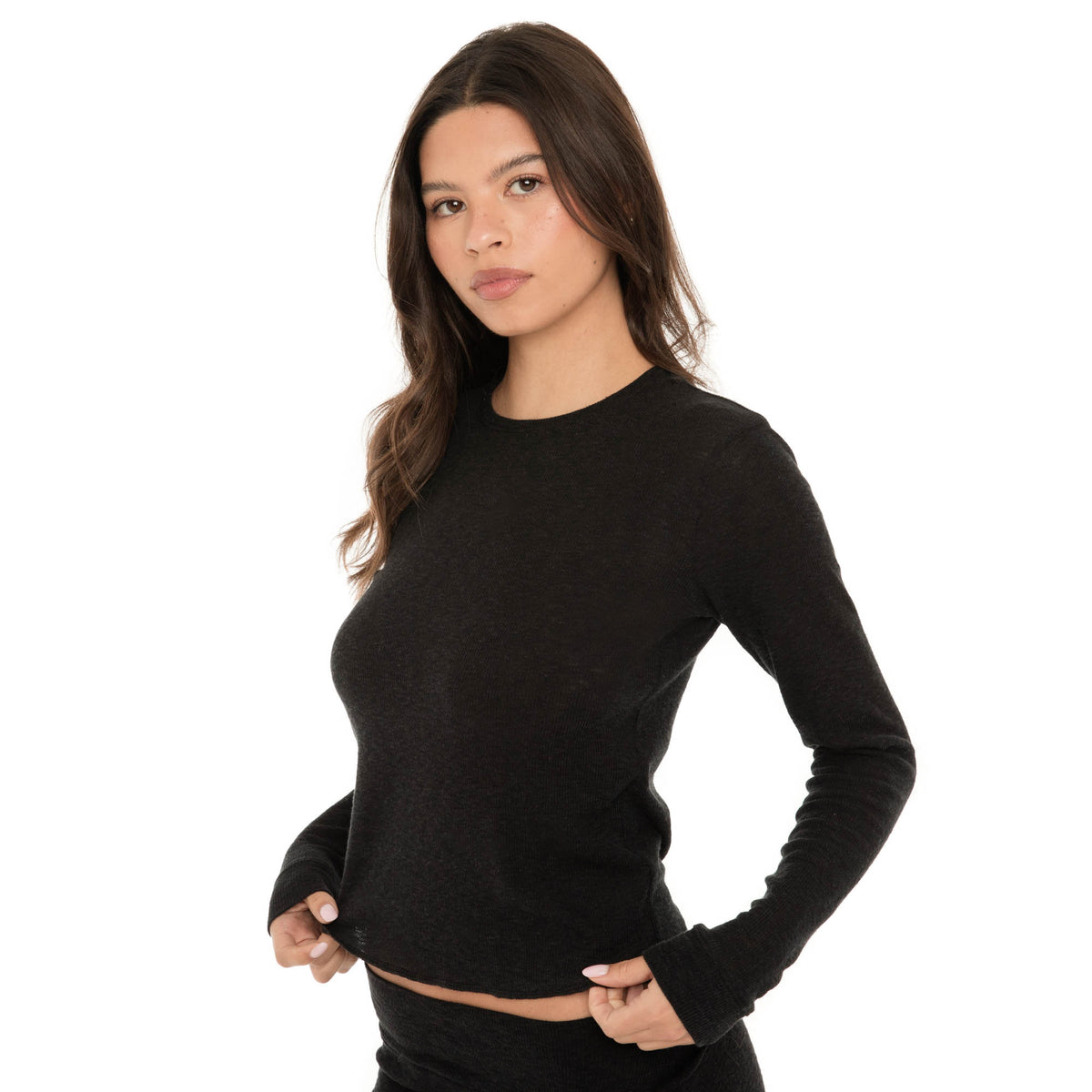close-up front view of Caeli long sleeve thermal top showing crew neckline and soft ribbed texture **black