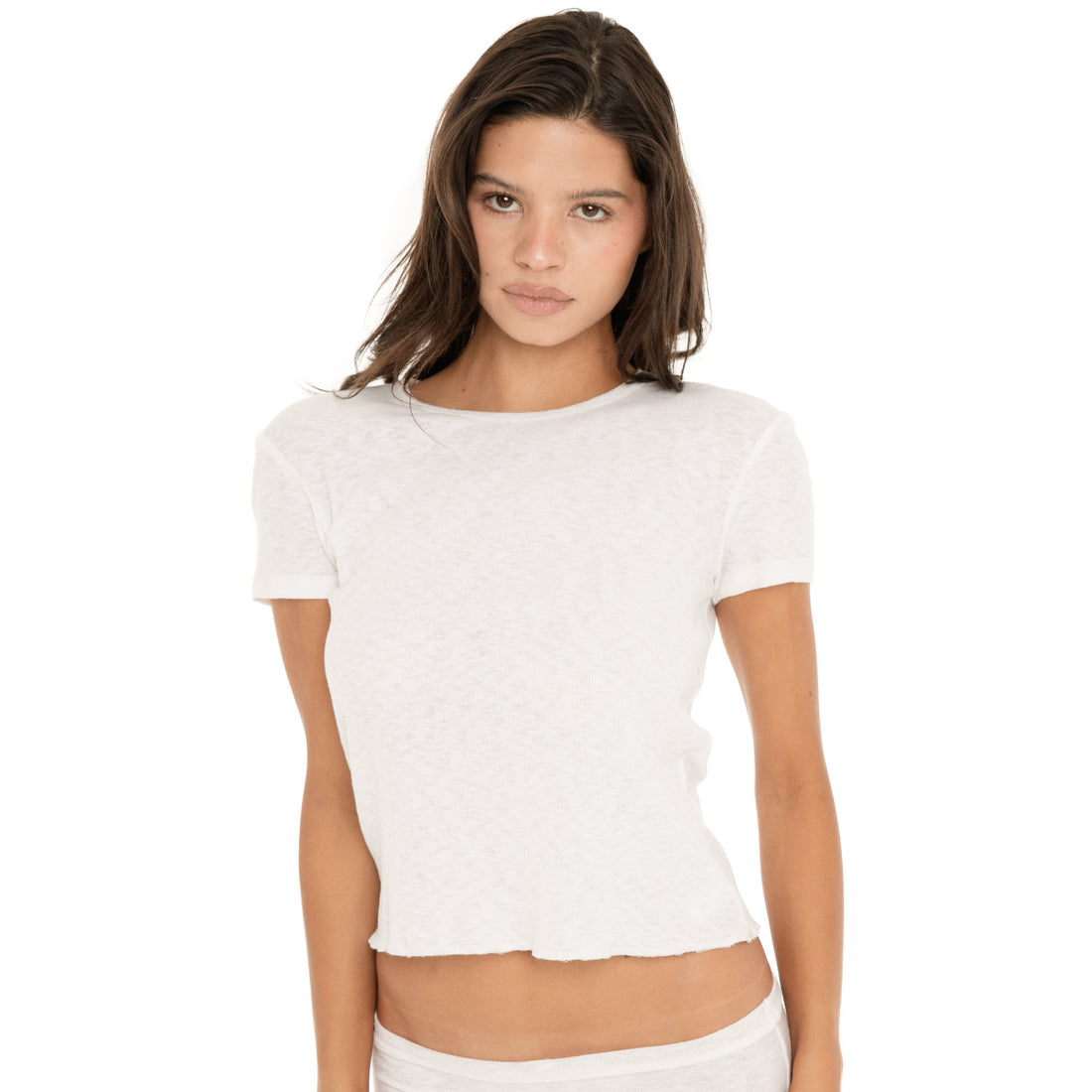 Front view of the Kimi Tee in White, highlighting its relaxed silhouette and cropped hem. **white