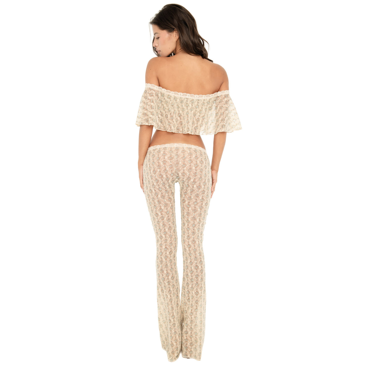 Back view of the Liani Pant in Sky Blossom, showing the sheer floral lace, low-rise waistband and long flared leg **sky blossom