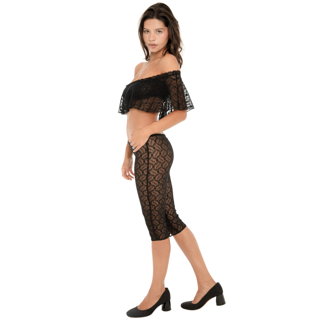 Side view of ARE YOU AM I Lyli Capri in Black showing the fitted sheer lace silhouette and cropped length **black