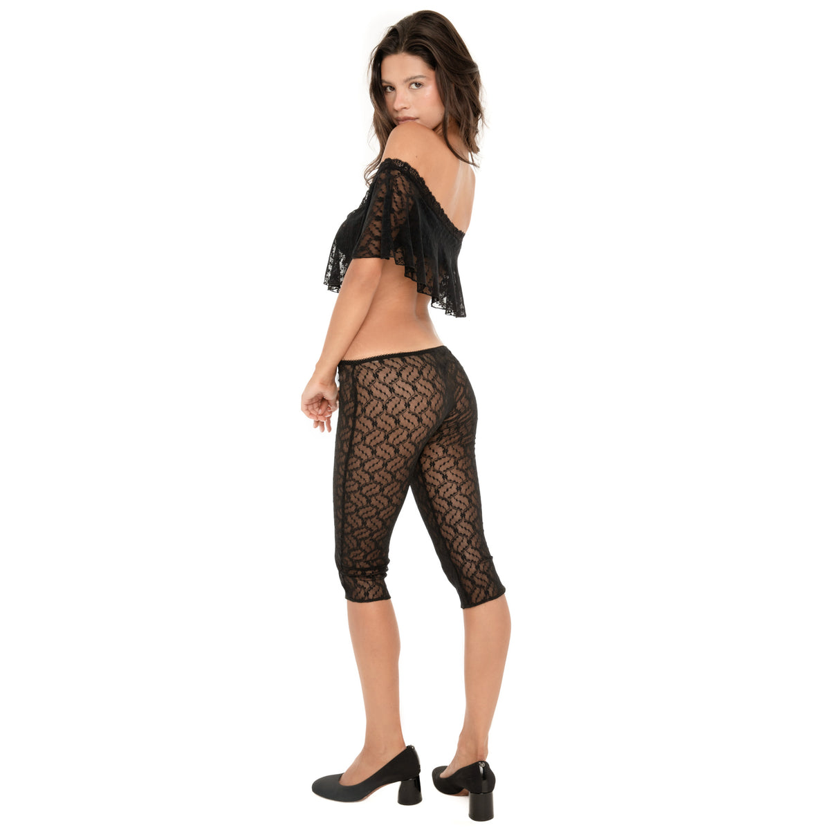 Back view of ARE YOU AM I Lyli Capri in Black, featuring sheer floral lace and a low-rise fit **black