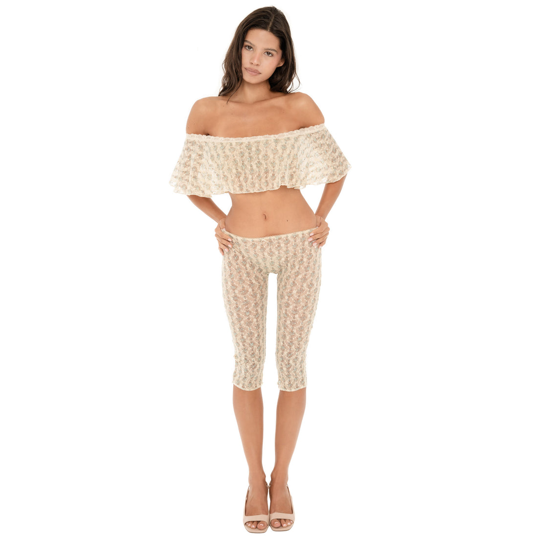 Model wearing ARE YOU AM I Lyli Capri in Sky Blossom, a sheer floral lace capri with a low-rise fit and delicate lace-trimmed waistband **sky blossom