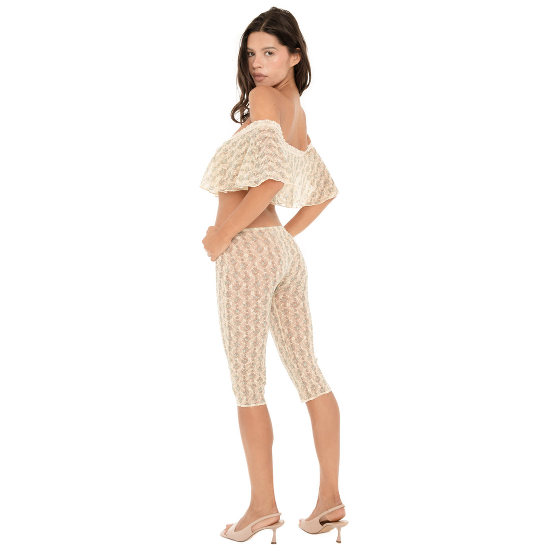 Back view of ARE YOU AM I Lyli Capri in Sky Blossom showing the sheer floral lace and fitted capri silhouette **sky blossom