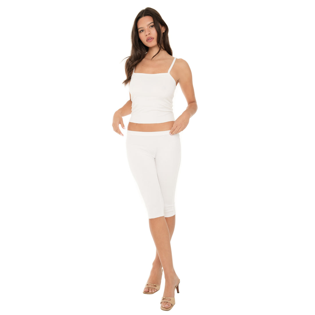 Full-body view of model wearing Are You Am I Miia Capri in white with low-rise fit and soft modal cotton stretch**white