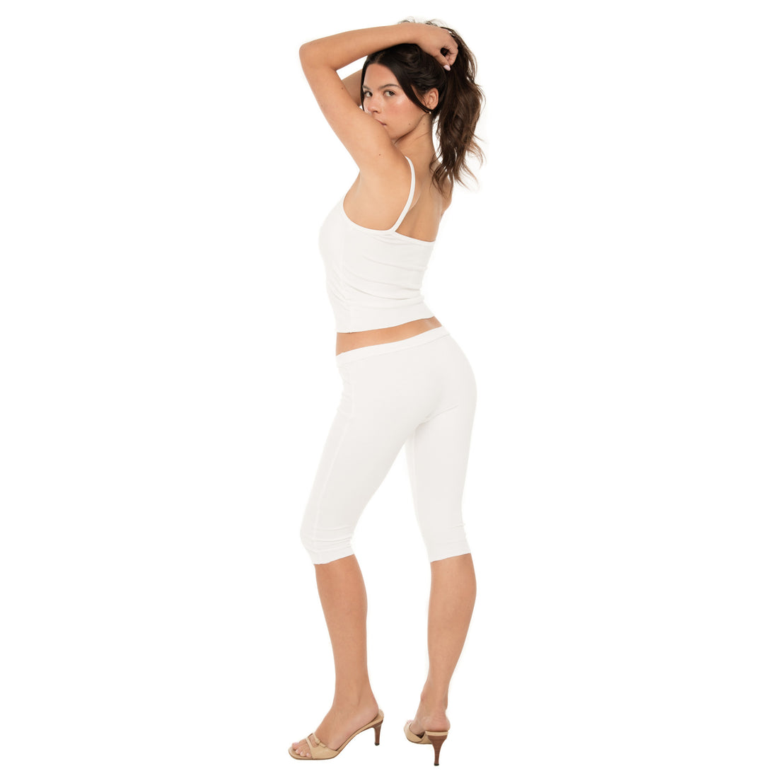 Three-quarter view of Miia Capri paired with matching tank, showcasing soft springy stretch and sleek 2000s-inspired fit**white
