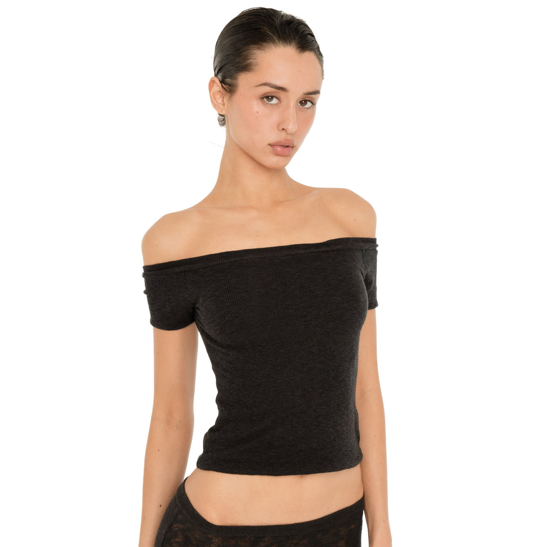 Close-up front view of the black Solei top with a fitted body, short sleeves, and wide off-the-shoulder neckline **black