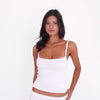Model wearing and moving in the Miia Tank in White, showing the fit, stretch and silhouette from multiple angles **white