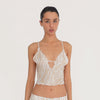 Video: Model wearing and moving in the Are You Am I Aria Camisole in Ivory Latte, showing the sheer zebra print, lace detailing, open tie back and matching Aria Skirt. **ivory-latte