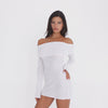 Video: Model wearing the Kina Dress in white, showing the sheer lightweight knit, wide off the shoulder neckline and mini silhouette in motion **white