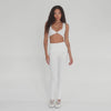 Video of Kixa Legging in white highlighting high waist, seamless design, and stretch fabric. **white