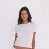 Model wearing the Kimi Tee in White with the Illi Capri, showing the relaxed cropped silhouette from multiple angles **white