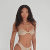 360-degree video of model wearing the Lele Bra in nude, showing front, side, and back views of the sheer floral lace design with underwire and delicate straps. **nude