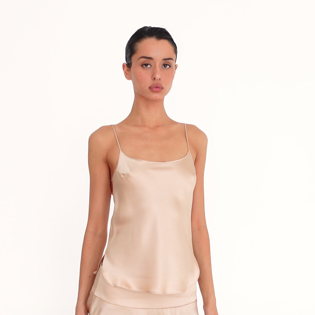 Video: Model wearing the Are You Am I Syra Camisole in Fawn with the matching Syra Skirt, showing the silk camisole from multiple angles. **fawn