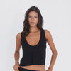 Model wears the black Kasia Tank and moves through different angles to show the cropped length, plunging neckline, wide shoulder straps and relaxed drape of the fabric **black